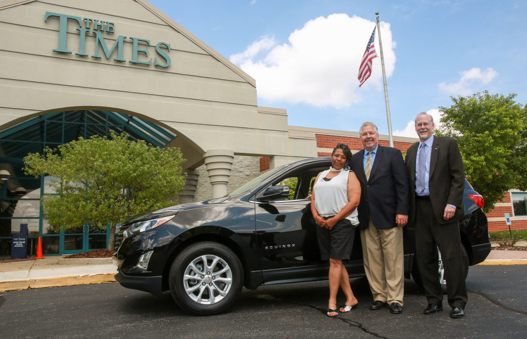 Presentation of new Chevy to Times/Chevy contest winner Lolita Whitehead